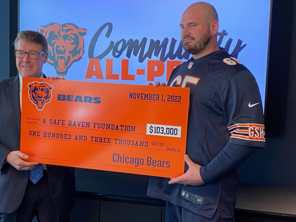 Chicago Bears presenting a donation check to A Safe Haven Foundation.