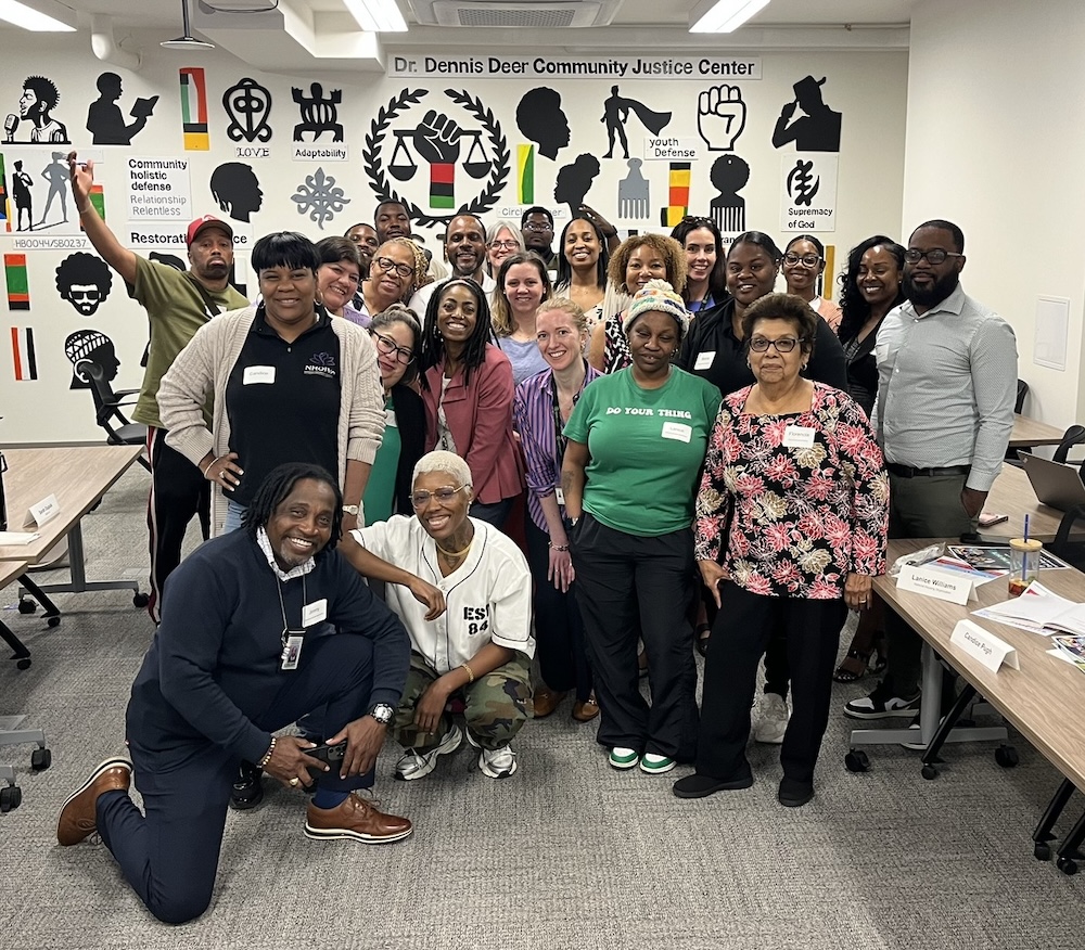 Community partners gathered at Dr. Dennis Deer Community Justice Center.