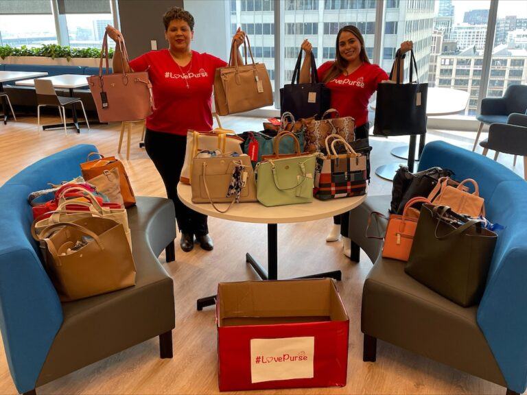 Volunteers sorting donation items at a table